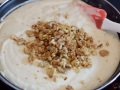 Añadir nueces y queso